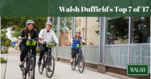 Walsh employees on bikes